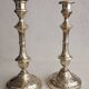 Pair of chiseled brass candlesticks