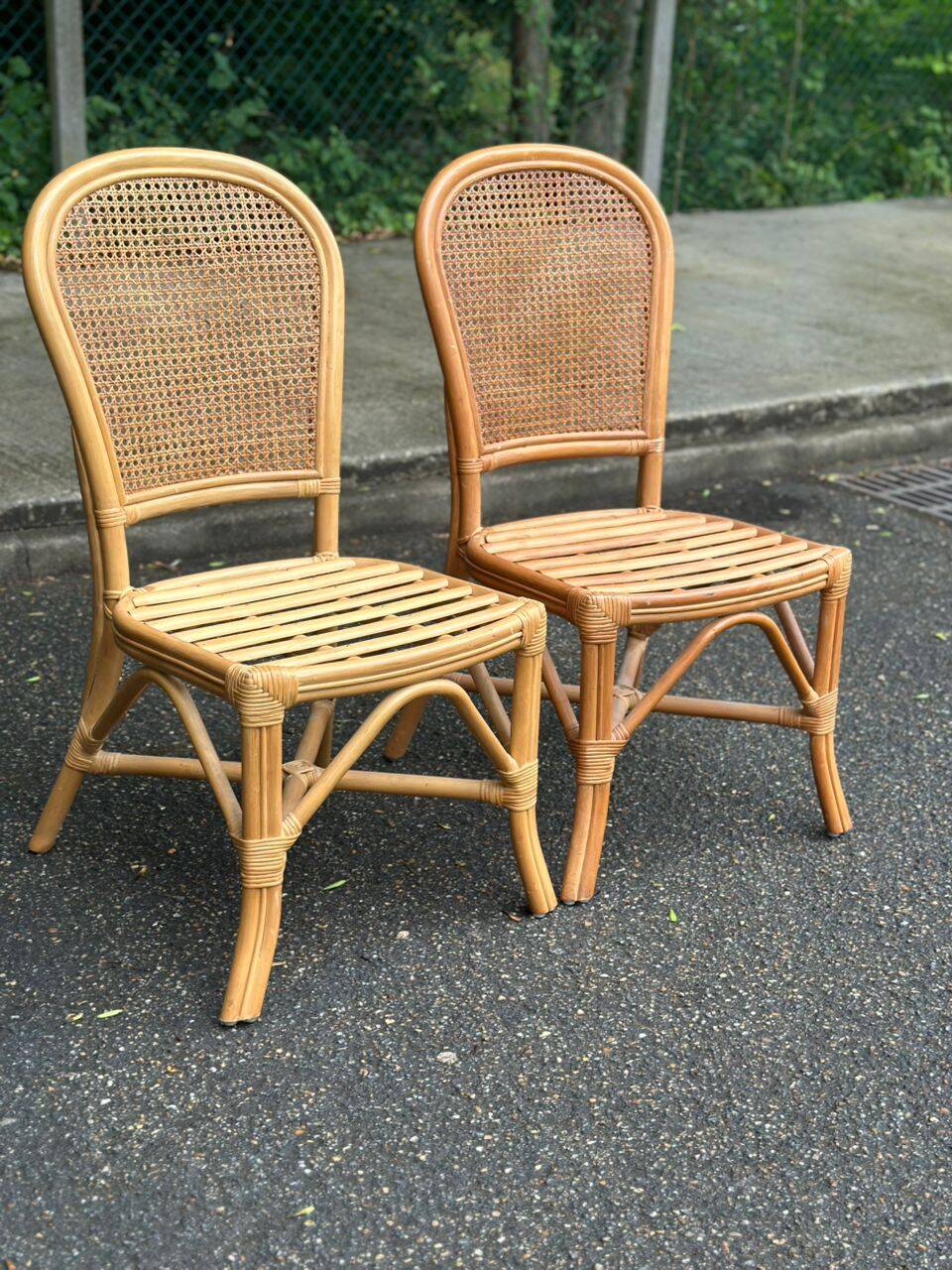 2 rattan and caned chairs in colonial bistro style from the 1990s.