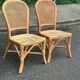 2 rattan and caned chairs in colonial bistro style from the 1990s.