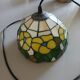 Antique stained glass and tin pendant light