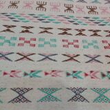 White carpet with multicolored Berber patterns handmade
