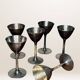 Set of six hammered metal goblets.