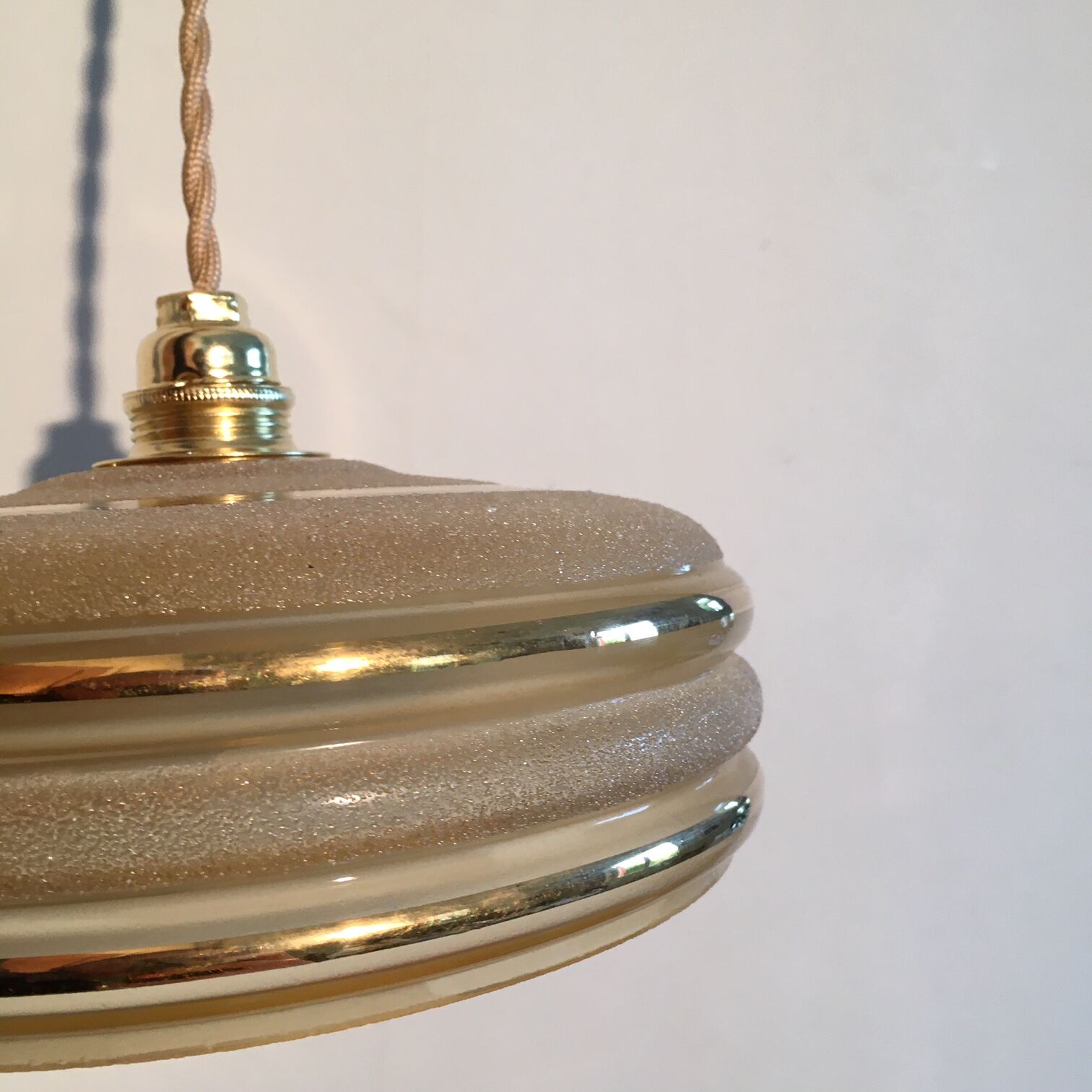 Hanging in yellow granite glass and golden edar