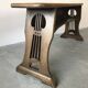 Art and Crafts style organ bench in solid oak.