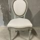 Armchair and 2 chairs set in Louis XVI style, light fabric, patinated wood.