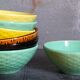 Seven vintage slip ceramic bowls