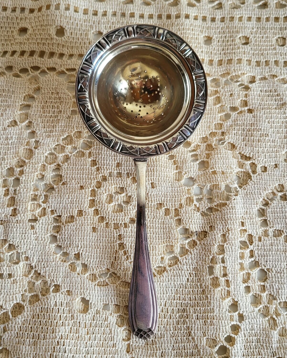 Silver-plated tea strainer