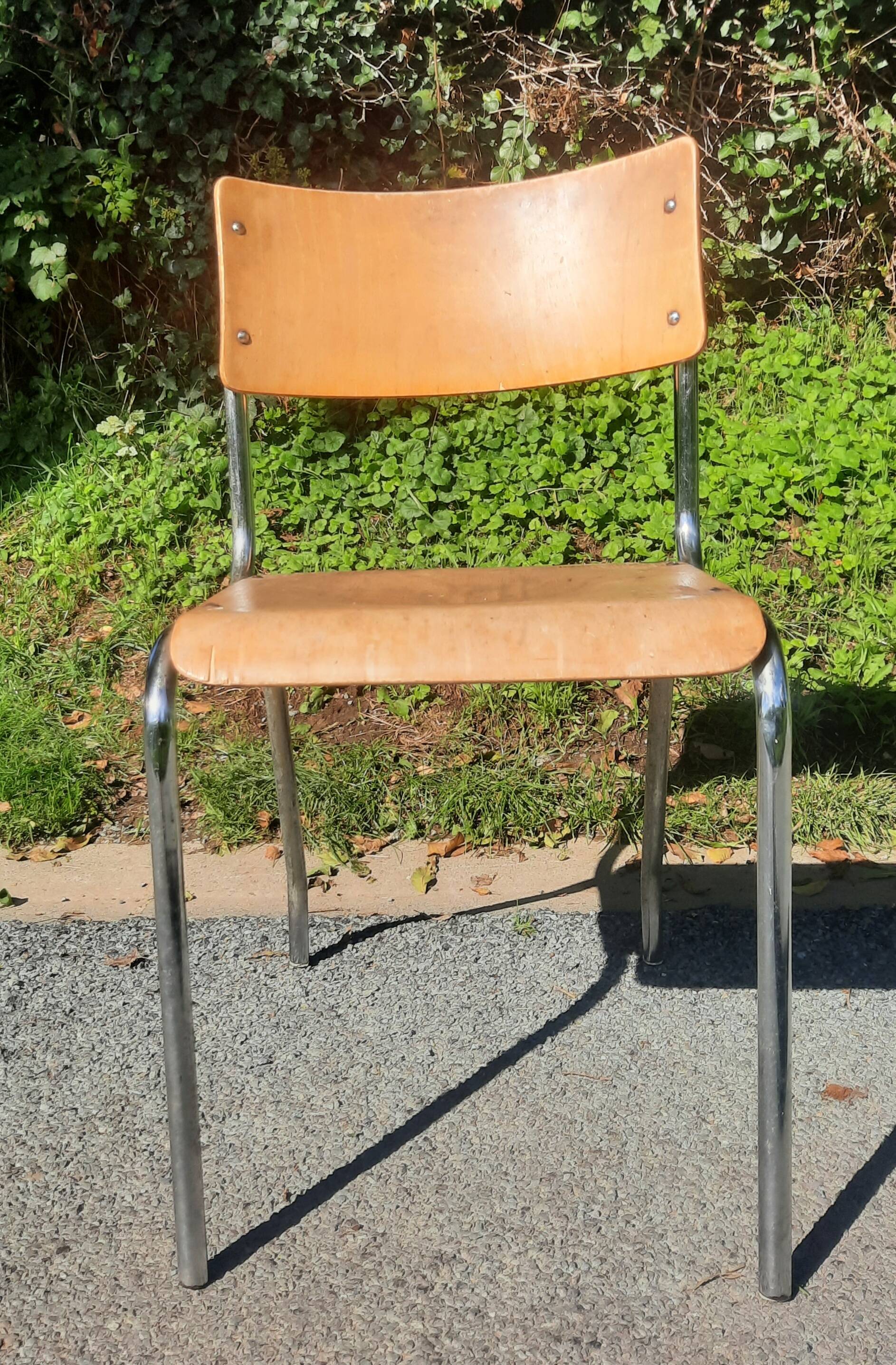 Vintage chair made of tube and wood