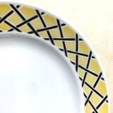 Plat rond semi-creux en faïence de Badonviller