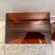 Pair of vintage smoked brown plexiglass side tables