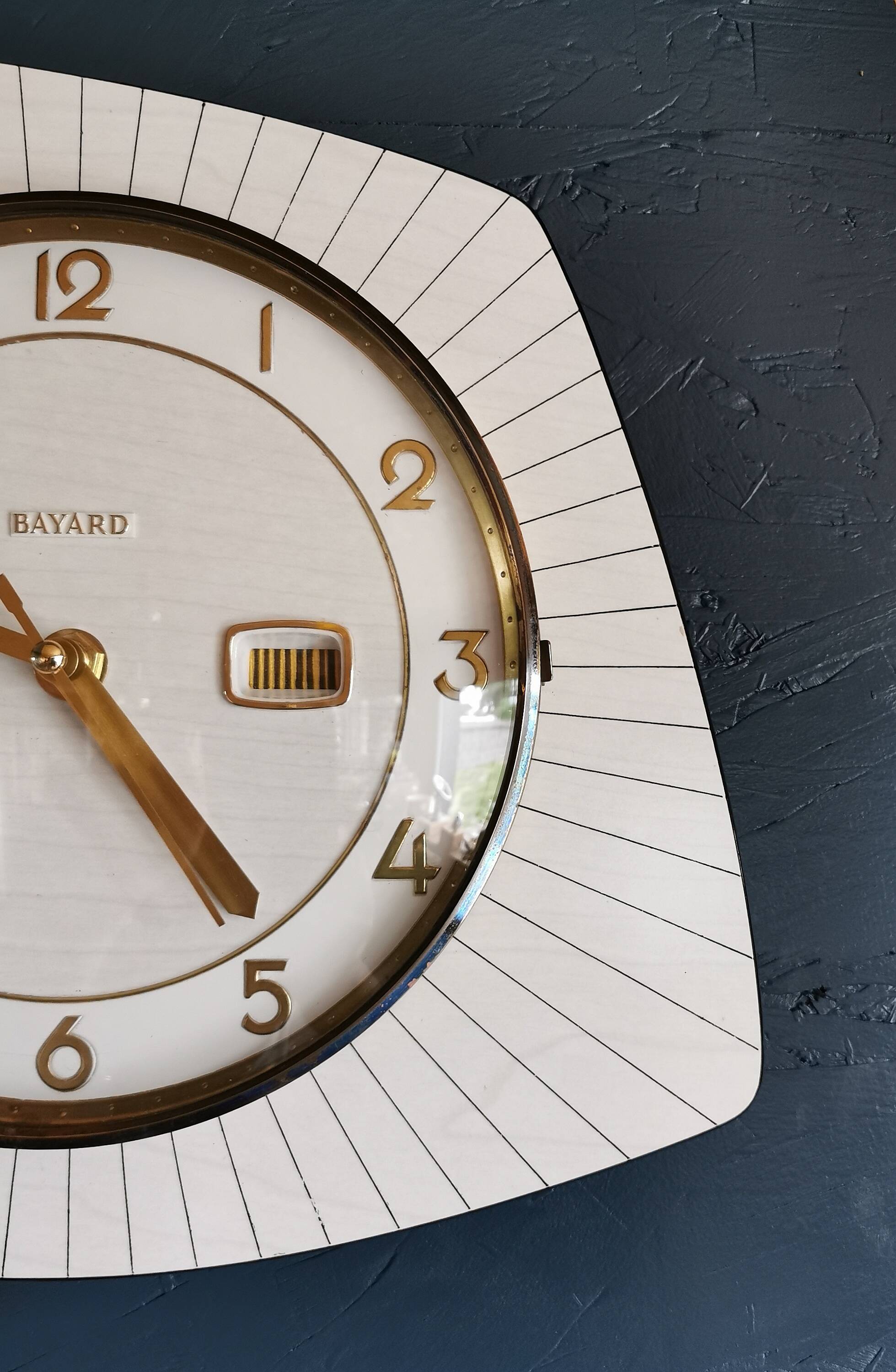 Vintage formica clock silent asymmetrical wall pendulum "Bayard wood lines"