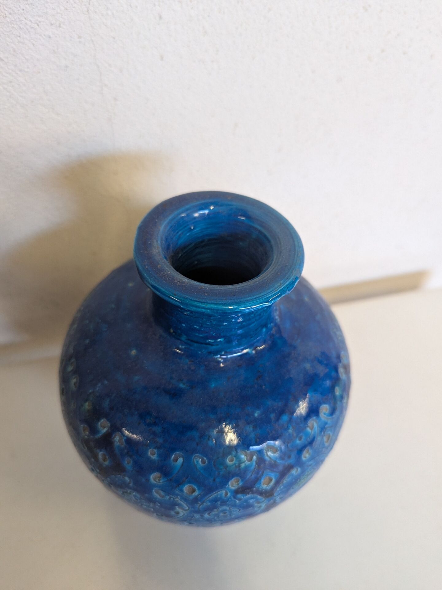 Vintage Italian vase in blue glazed ceramic, relief decoration.