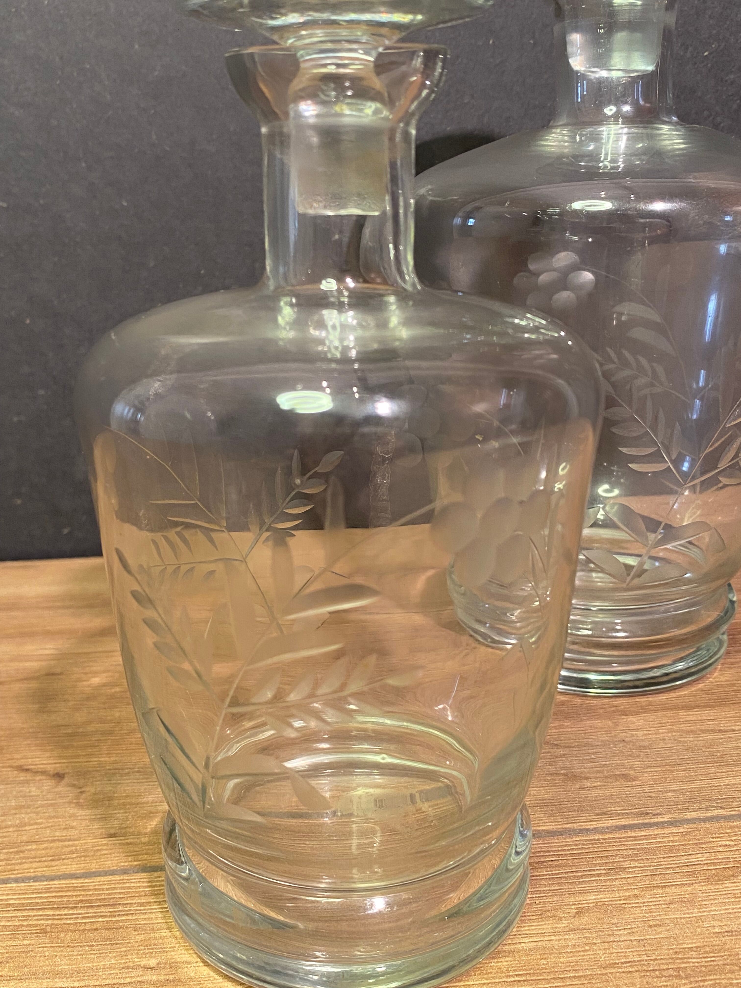 Two carafes in cut glass with vegetal decoration, vintage design