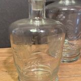 Two carafes in cut glass with vegetal decoration, vintage design