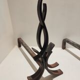 Paire de chenets en fer  forgé par Raymond Subes vintage