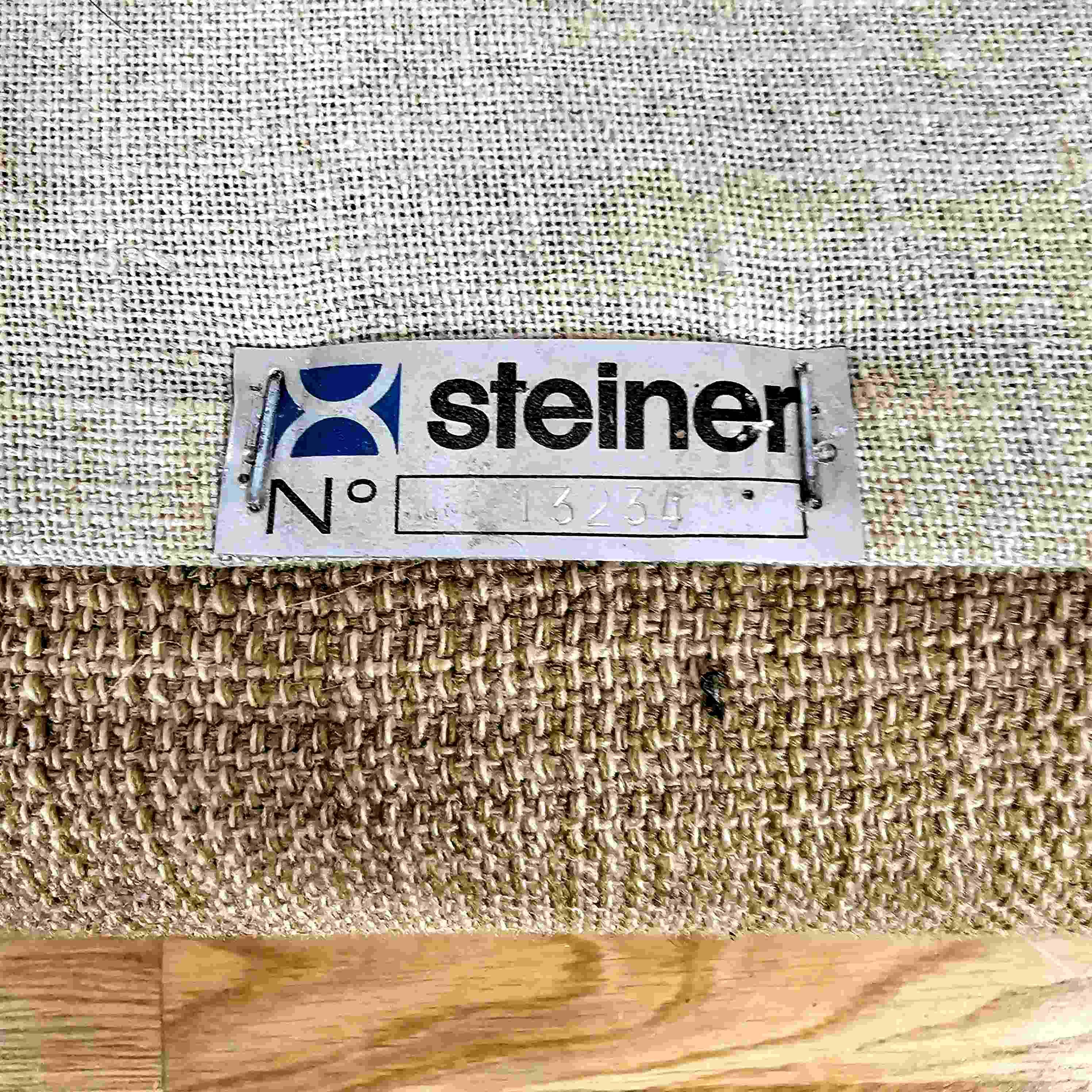 Steiner-Paris, green cloth armchair and ottoman, circa 1950/1960