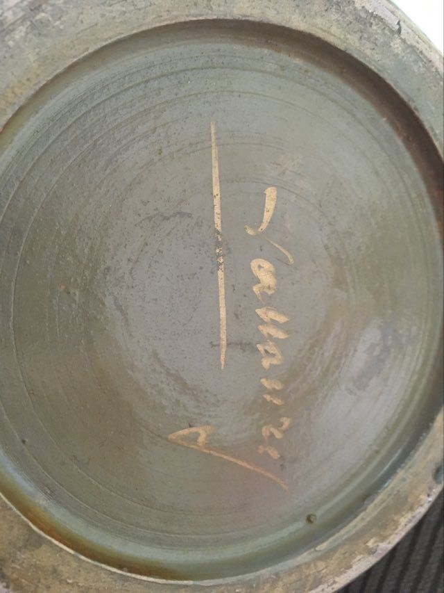 Treated terracotta vase