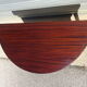 Half-moon console table, extendable in Empire style.