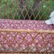 Vintage rattan baby cot