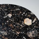 Round sidetable with stone top and three chromed legs