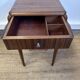Art Deco sewing table in walnut with a foldable shelf.