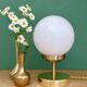 Vintage globe table lamp in white opaline.