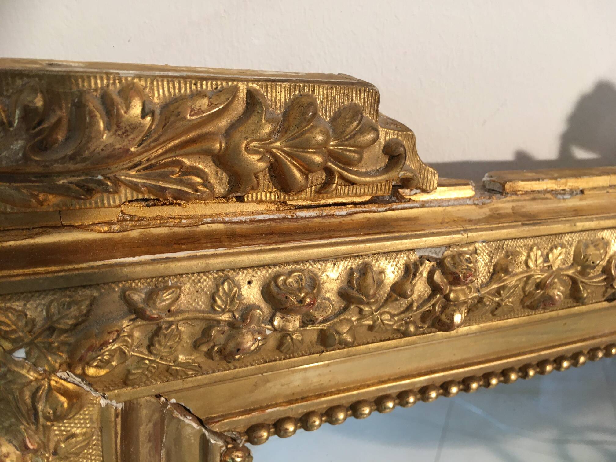 Louis XVI style and 19th century fireplace mirror