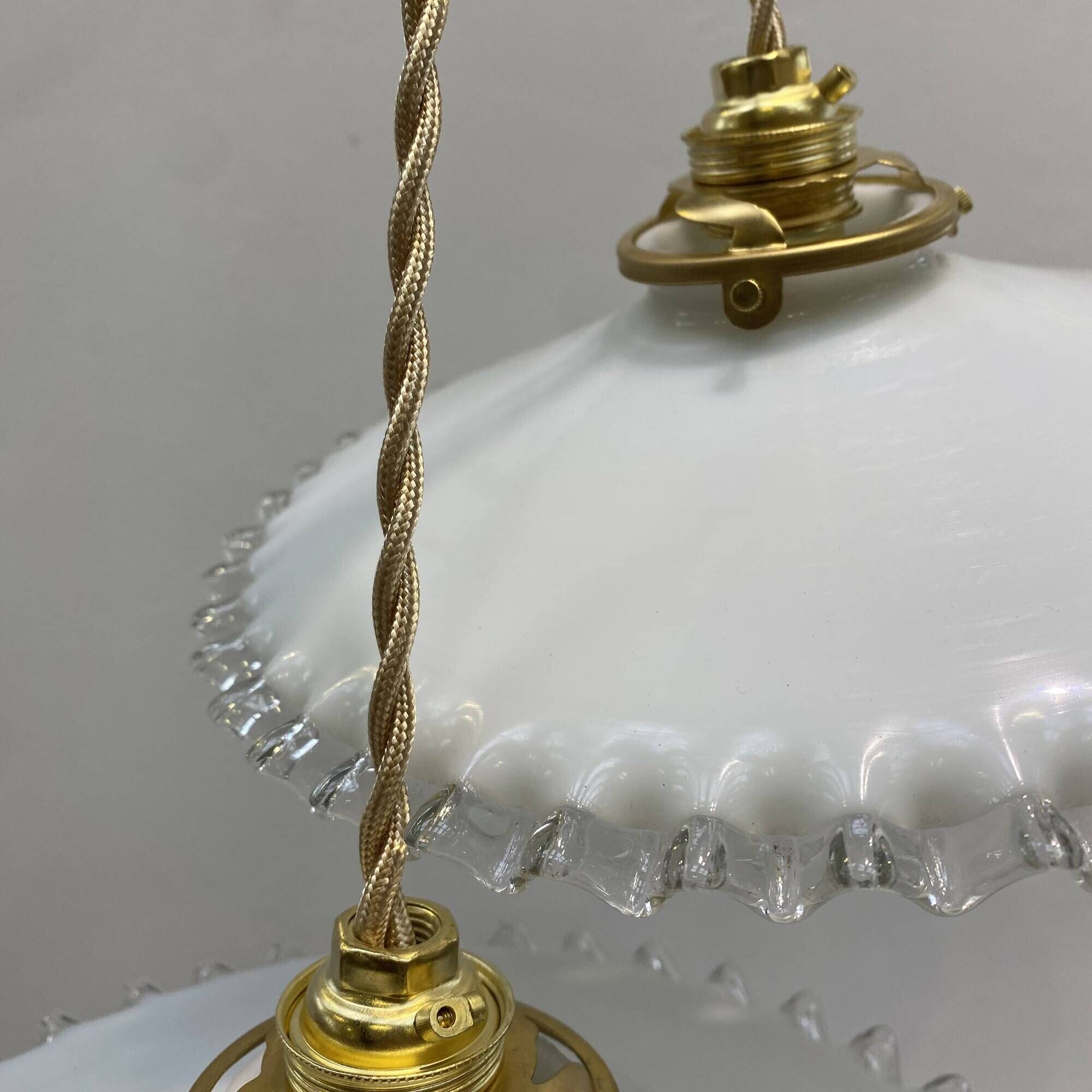 Pair of vintage pendant lights in white opaline and transparent serrated edges