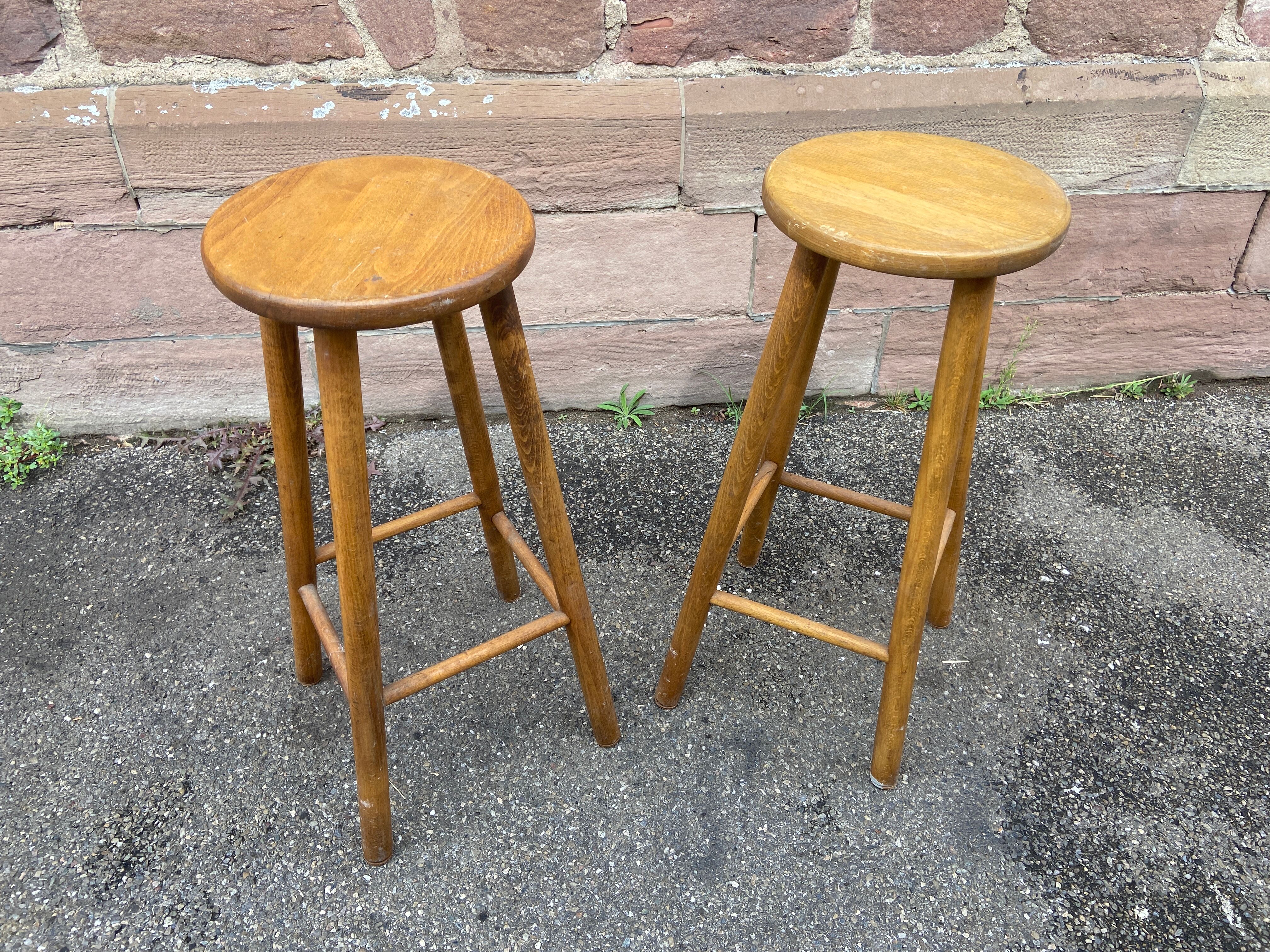 pair of vintage wooden bar stools