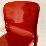 Red chair "selene" by vico magistretti for artemide of the 60s
