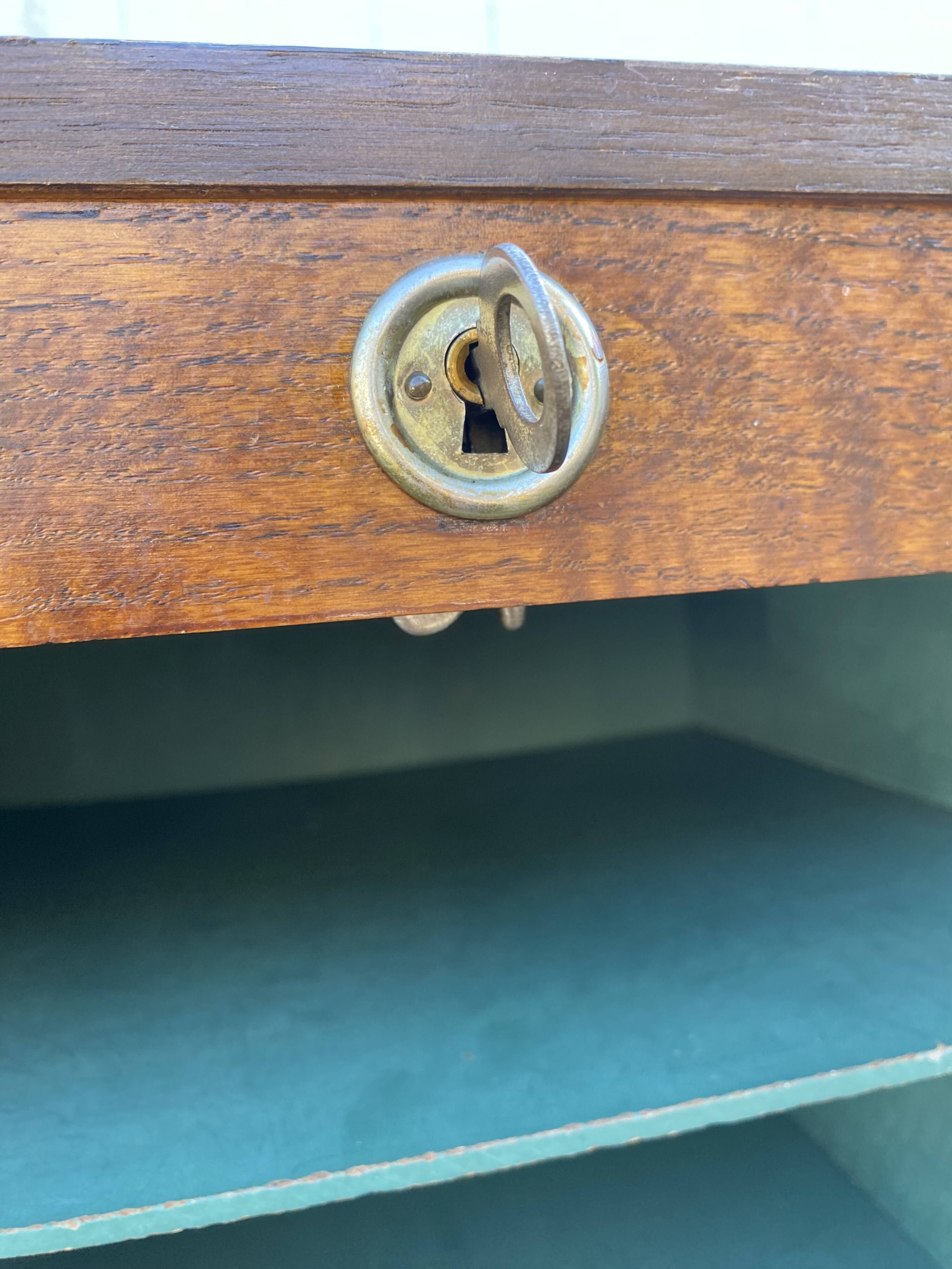 1970 oak office storage cabinet with curtains.