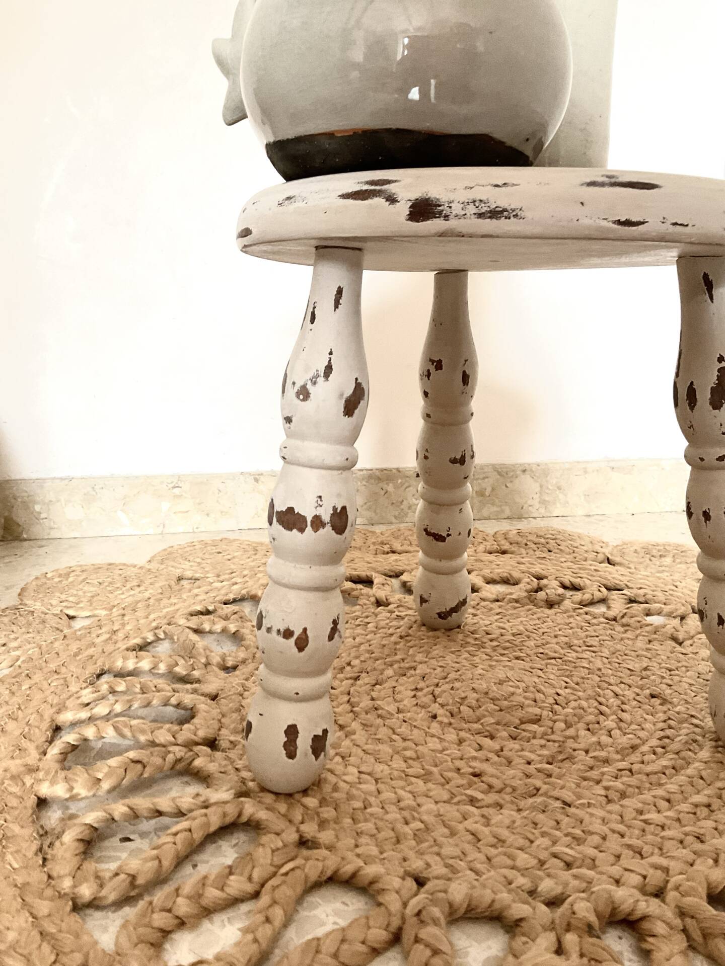 Patinated tripod stool