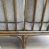 Two-seater rattan sofa with natural tones