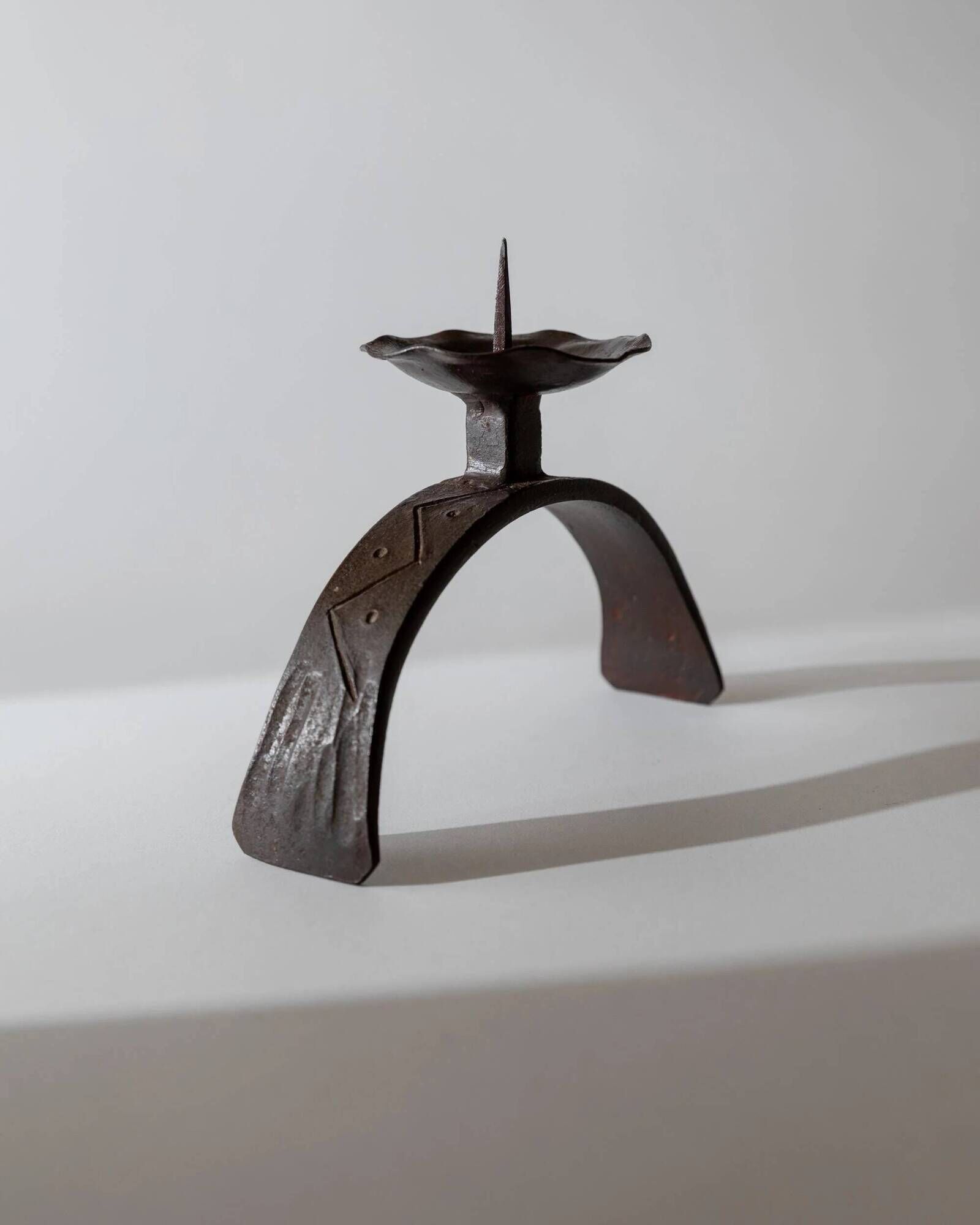Vintage wrought iron candlestick from the 1960s, sculptural relief pattern for pillar candle, rustic Mid-Century metal, elegant gift idea.
