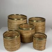 Set of 5 rattan pencil reed and brass plant holder baskets, Italy 1970s