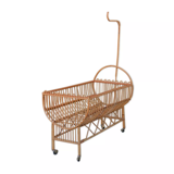 Vintage rattan crib, casters and matte for bed sky