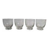 Set of four Art Deco style engraved crystal glasses on spherical feet