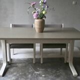 Dining table set and 4 dining chairs by Pierre Mennen for Pastoe.