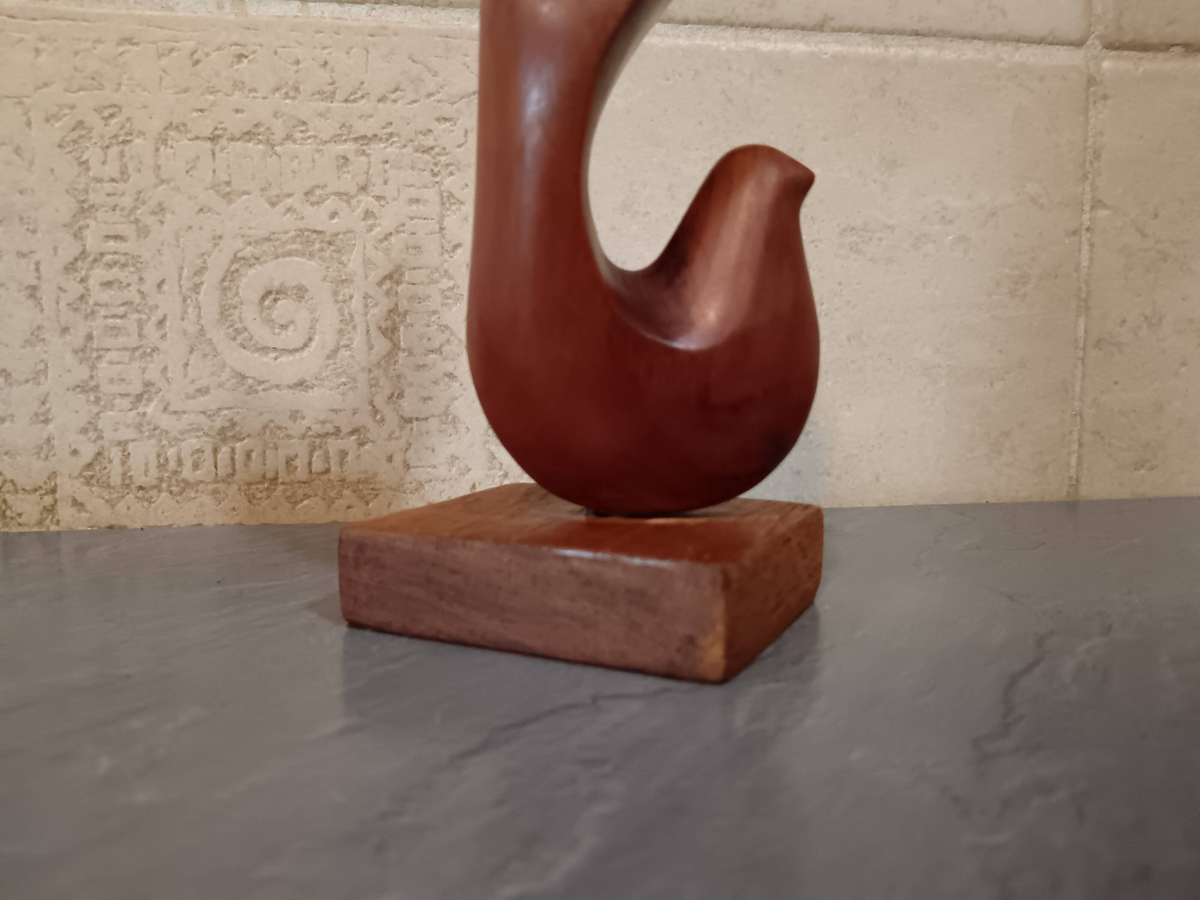 Scandinavian dove in carved teak wood, signed NM, circa 1960.