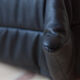 Armchair and ottoman in black leather model designed by Michel Ducaroy 1973