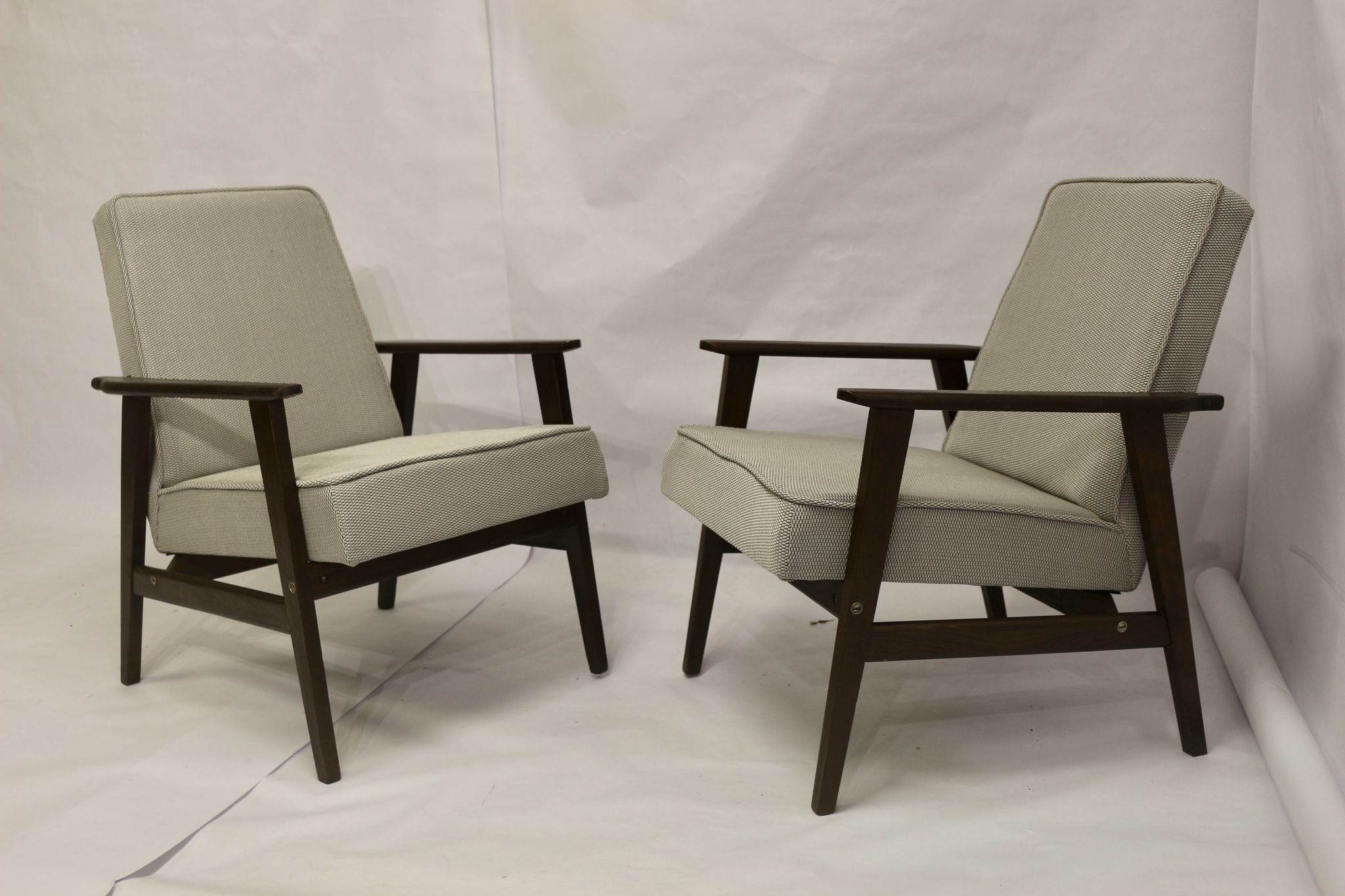Pair of Henryk Lis armchairs 300-190s 1970s reupholstered gray textured fabric.