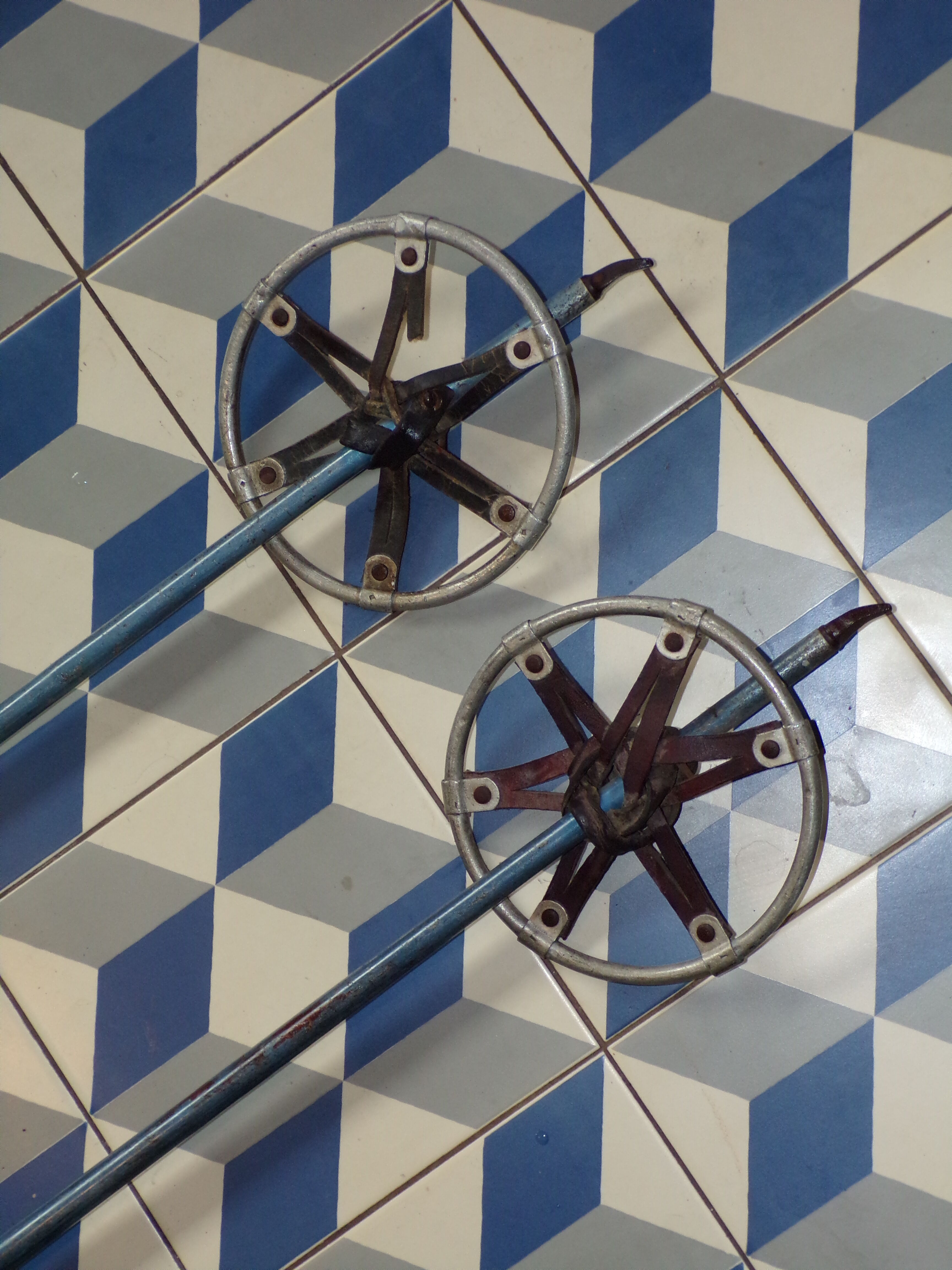 Vintage metal and leather ski poles