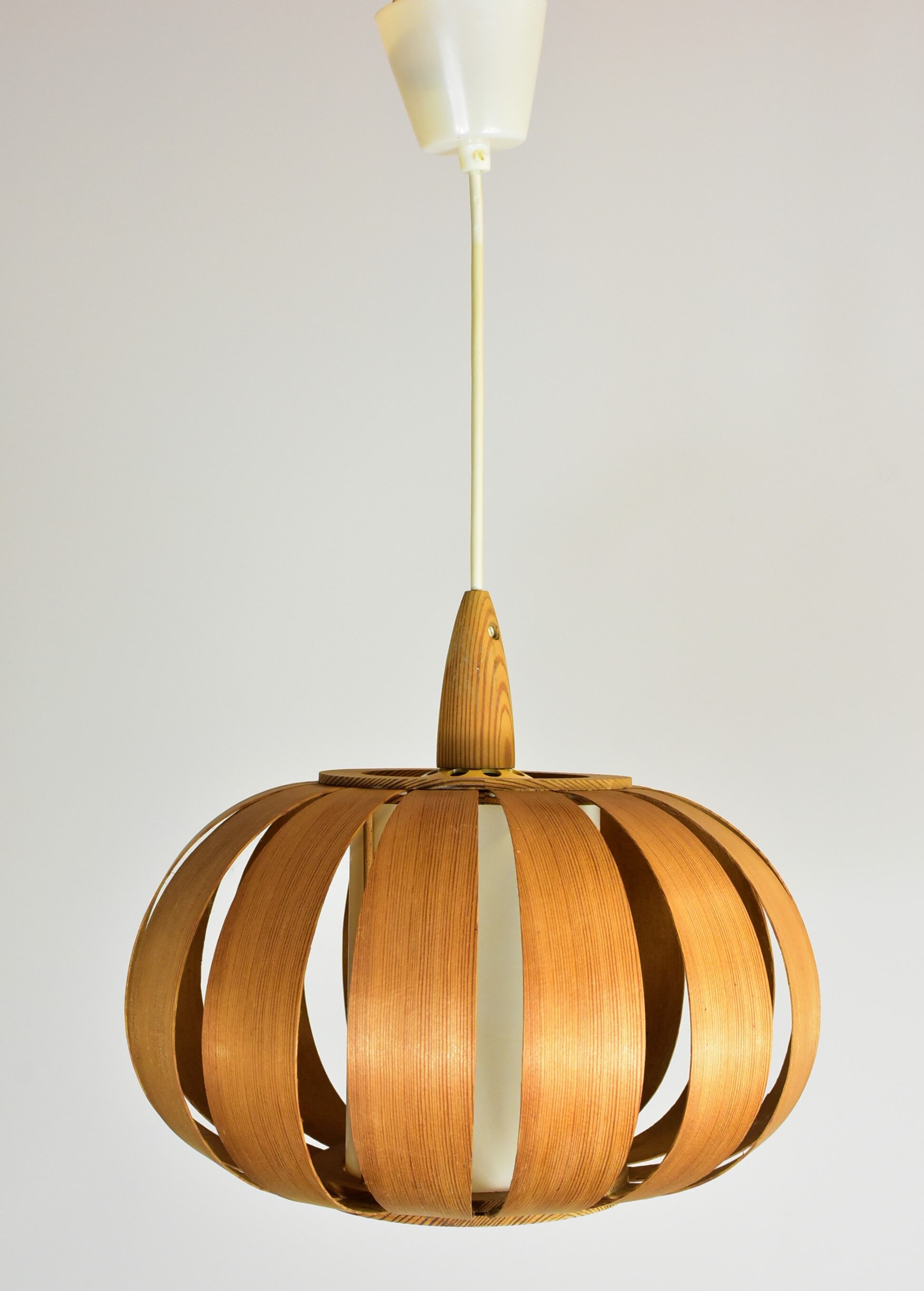 Scandinavian-style wooden pendant light.