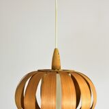 Scandinavian-style wooden pendant light.