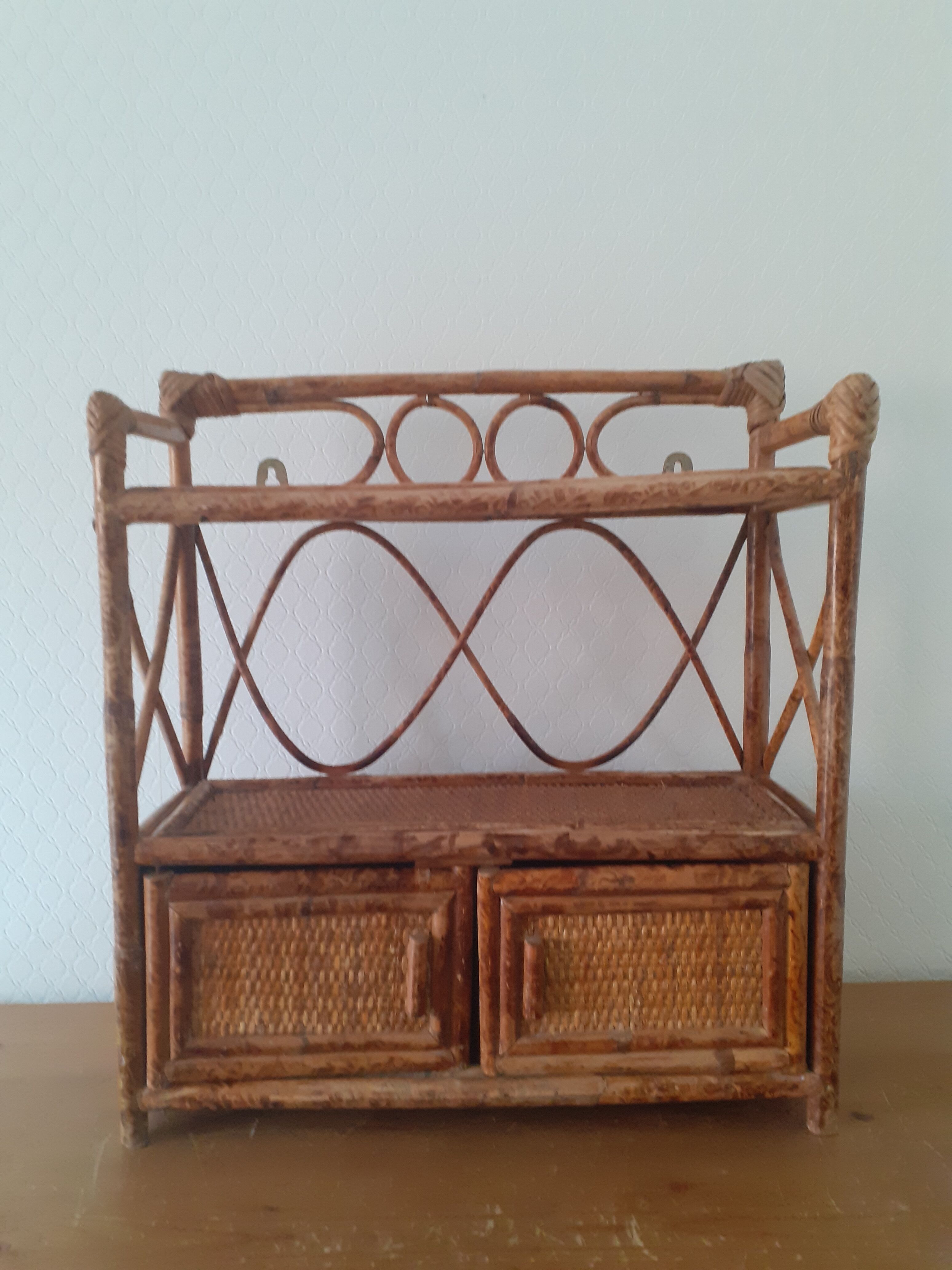 Rattan wall shelf