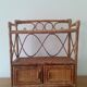 Rattan wall shelf
