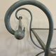 Patinated green-grey wrought iron dessert table