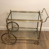 Neoclassical style rolling table in silvered brass