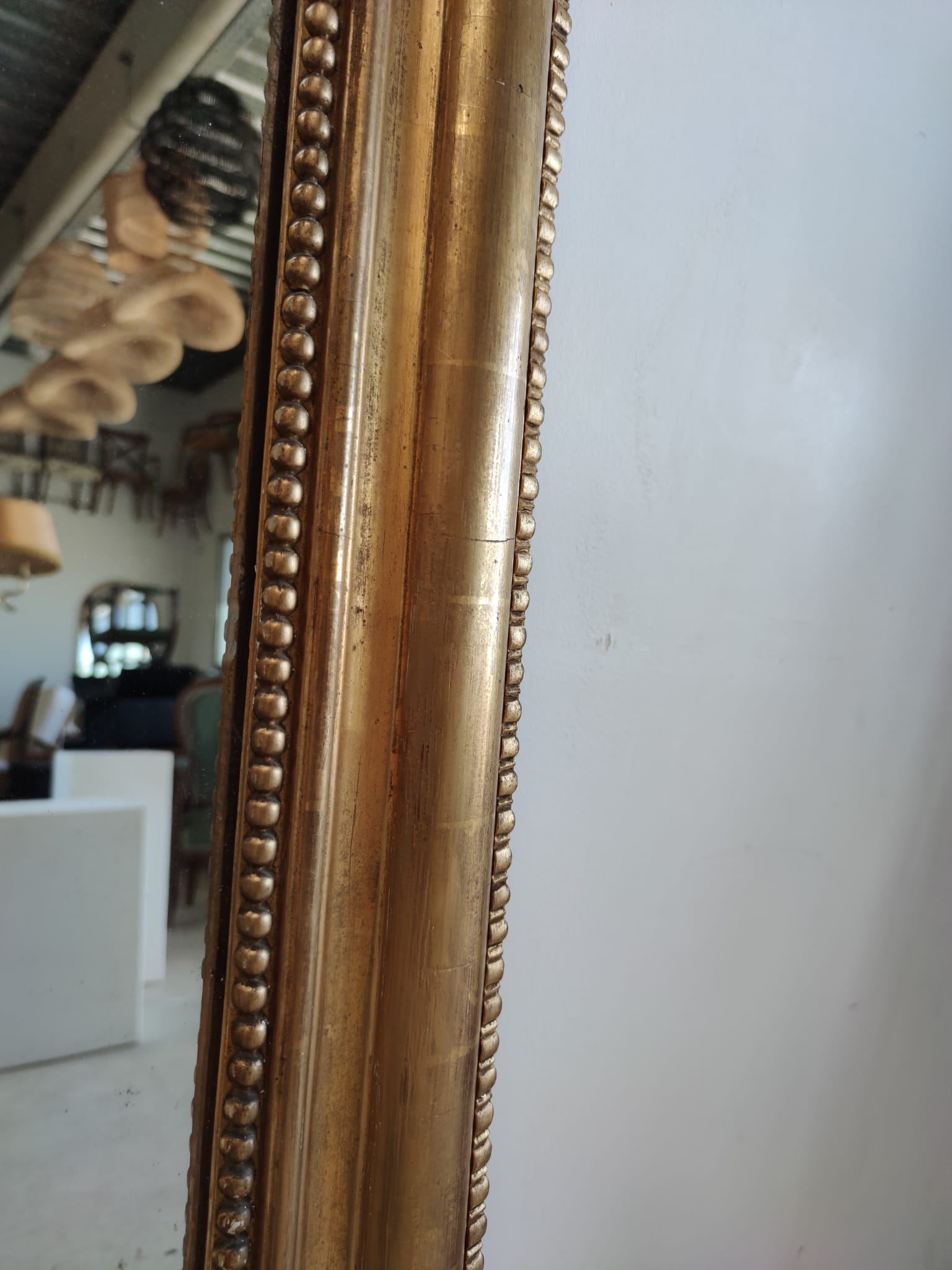 Louis Philippe gilded mirror with gendarme hat nineteenth H:130cm