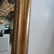 Louis Philippe gilded mirror with gendarme hat nineteenth H:130cm